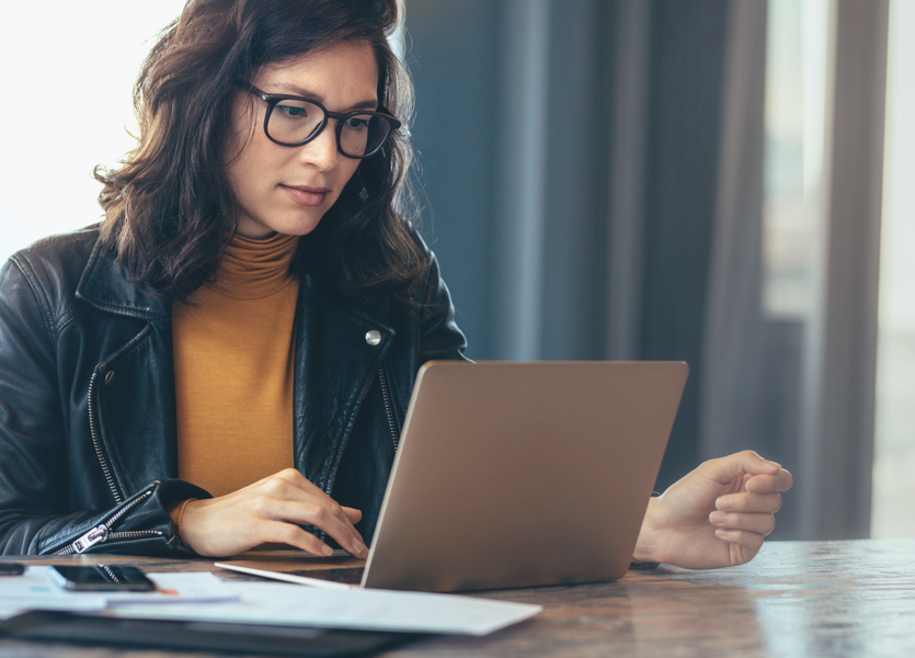 Woman using laptop for business