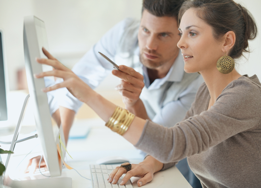 Transaction coordinator checking documents